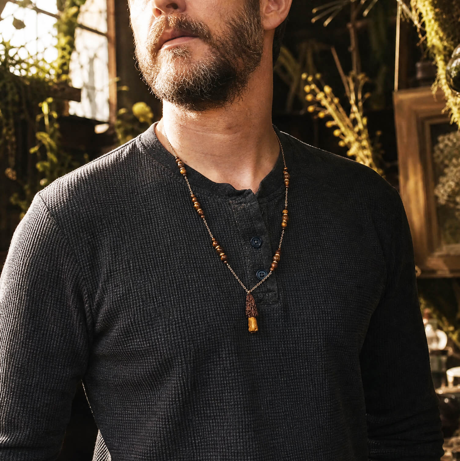 tiger's eye morel mushroom necklace on man